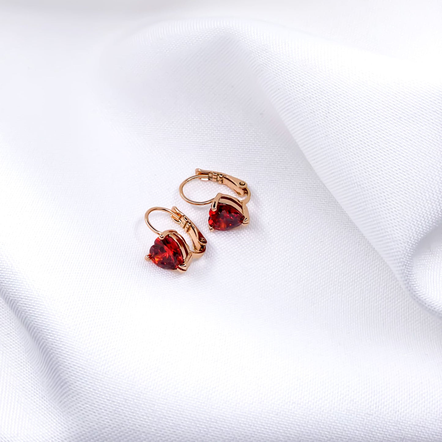 Gold ruby heart earrings