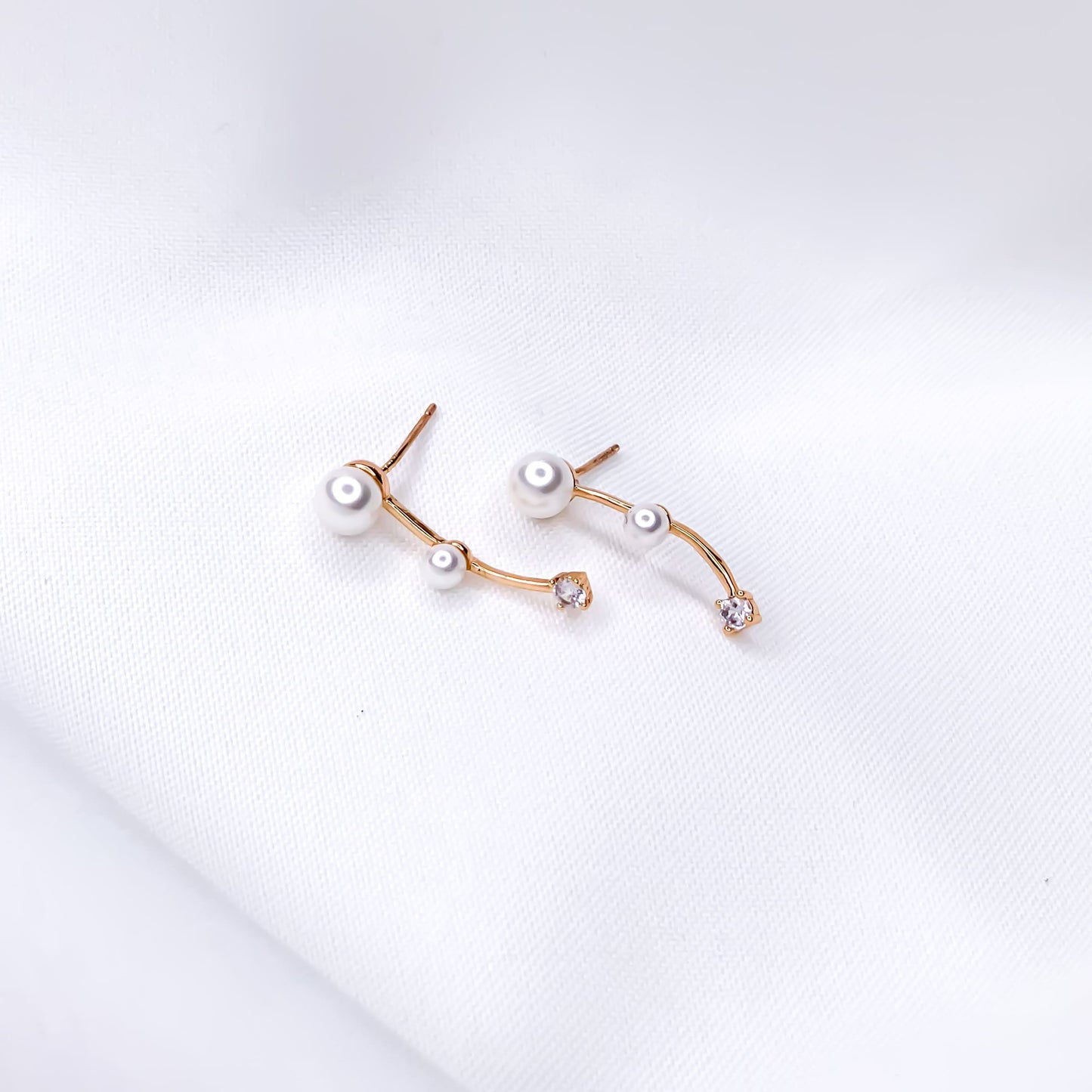 Gold drop stud earrings with pearls