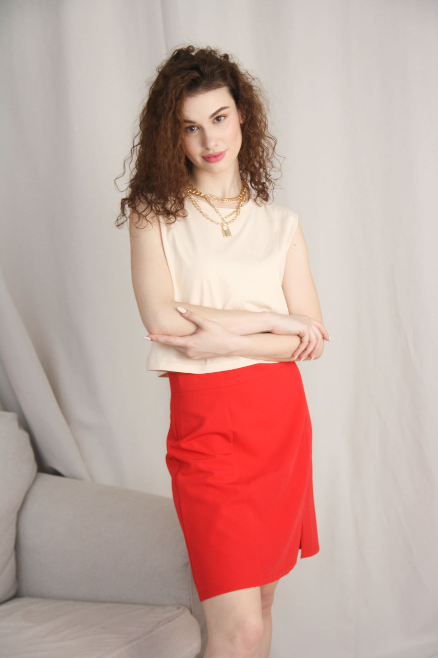 Beige Sleeveless T-Shirt With Red Mini Skirt