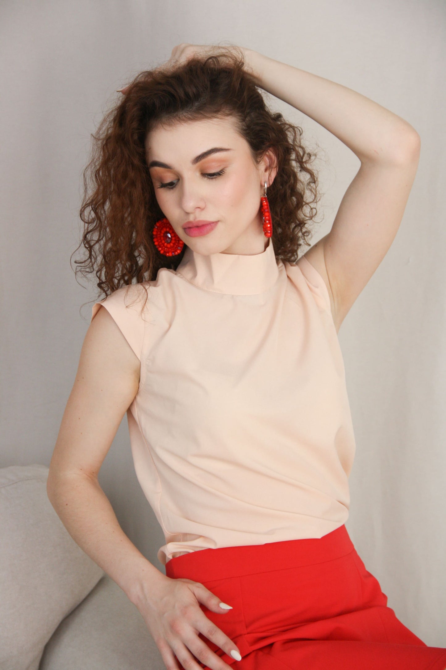 Light Peach Short Sleeve Blouse With Red Mini Skirt