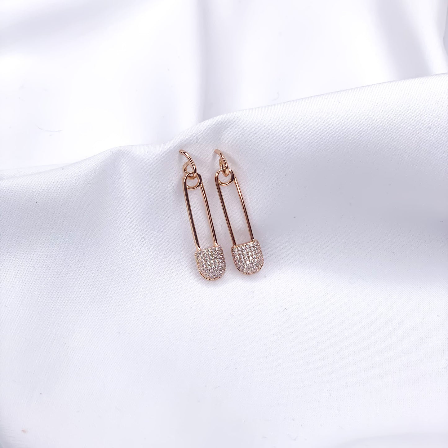 Gold dangle pin earrings