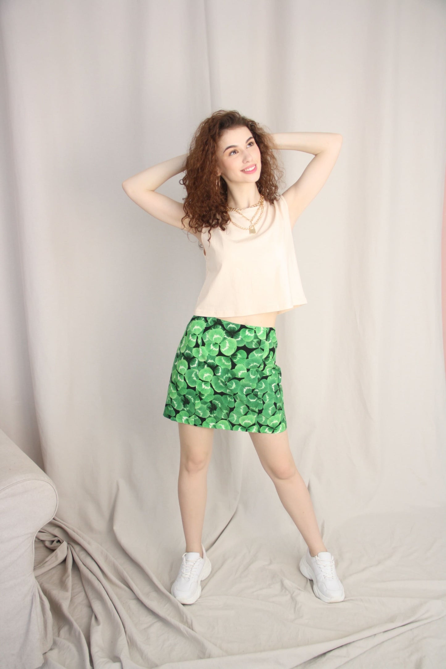 Beige Sleeveless T-Shirt With Green Mini Skirt